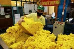 Processing rubber for export at a factory of the Phu Rieng company in Binh Phuoc province (Photo: VNA)