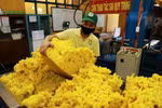 Processing rubber for export at a factory of the Phu Rieng company in Binh Phuoc province (Photo: VNA)