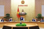 PM Pham Minh Chinh chairs the Government’s regular meeting on December 6. (Photo: VNA)
