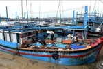 Fishermen in the Dong Tac fishery port of Phu Yen ward, Dak Lak province, prepare for a new trip after storm. (Photo: VNA)