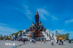 A Buddha statue on Ba Den Mountain. The mountain in Tay Ninh is one of the most popular tourist destinations in the country, attracting large numbers of visitors from across Vietnam. (Photo: VNA)