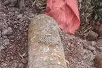 The bomb was buried about 50cm underground and found on July 8 by a resident in in Mau Son hamlet, Luc Nam commune. (Photo: VNA)