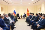 Prime Minister Pham Minh Chinh meets with President of the Russia–Vietnam Friendship Association (RVFA) Vladimir Petrovich Buyanov, and Nikolay Nikolaevich Kolesnik, Chairman of the Russian War Veterans' Association (RWVA), who had fought in Vietnam, in Moscow on March 25 (Photo: VNA)