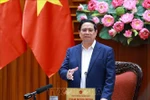 Prime Minister Pham Minh Chinh speaks at the meeting of permanent Government members in Hanoi on December 23. (Photo: VNA)