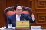 Prime Minister Pham Minh Chinh speaks at the meeting on Government restructuring in Hanoi on January 13. (Photo: VNA)
