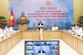 Prime Minister Pham Minh Chinh speaks at the conference on social housing development on August 16. (Photo: VNA)