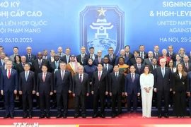 Vietnamese State President Luong Cuong (centre, first row), United Nations Secretary-General Antonio Guterres (fifth from left) and heads of delegations at the signing ceremony. (Photo: VNA)