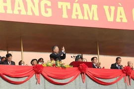 Party General Secretary To Lam (standing) and delegates attend the ceremony. (Photo: VNA)