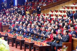 Party and State leaders attend the 11th National Patriotic Emulation Congress. (Photo: VNA)