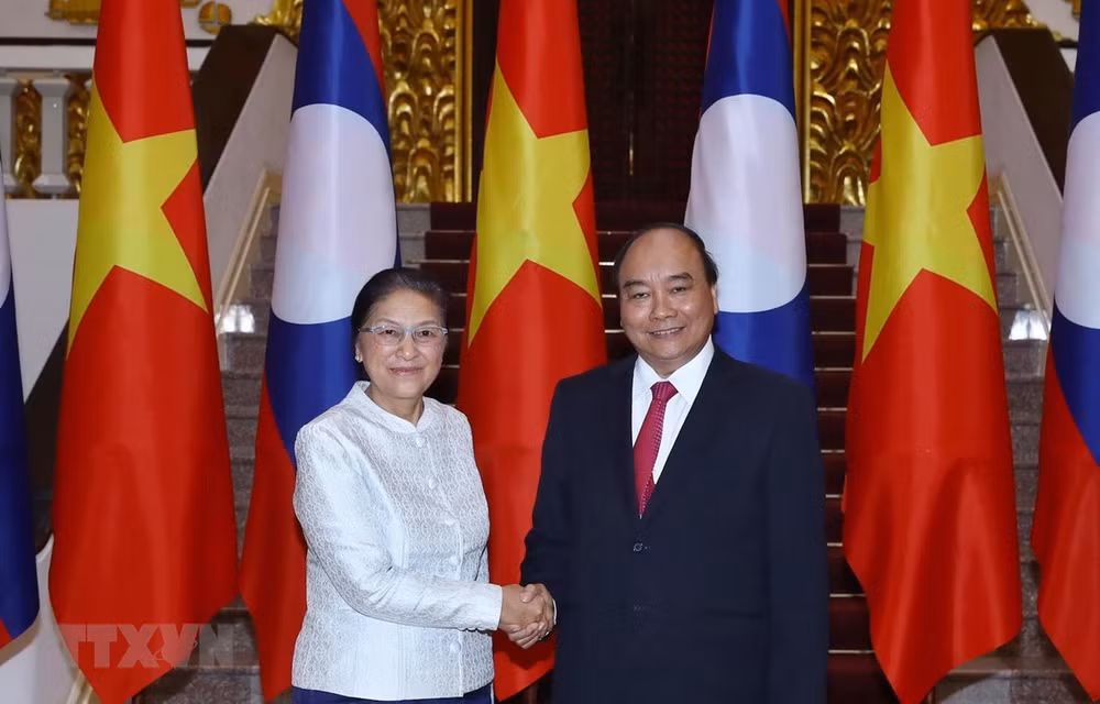 PM hosts Lao National Assembly leader ảnh 1