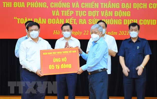 State-owned firms donate close to 36 billion VND for COVID-19 fight ảnh 1
