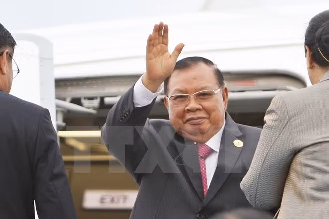 Lao leader begins Vietnam visit ảnh 1
