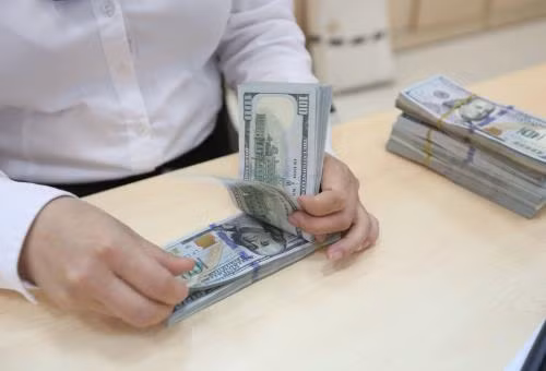 Reference exchange rate goes down 3 VND ảnh 1