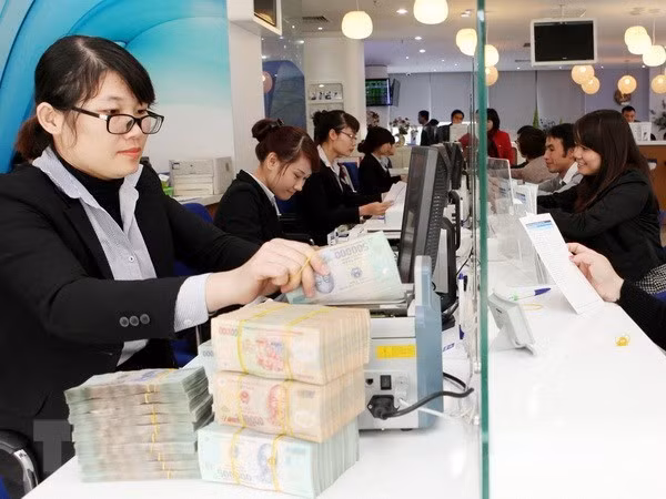 Reference exchange rate up 7 VND ảnh 1