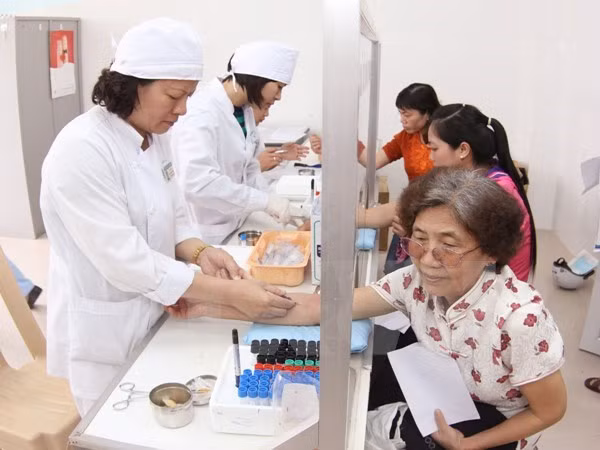 Hanoi targets to raise health insurance coverage ảnh 1