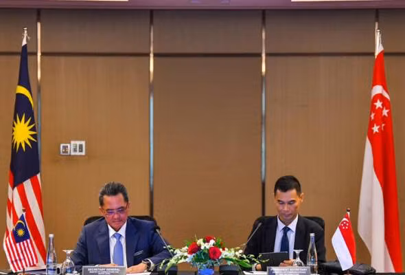 Malaysia, Singapore strengthen cooperation in data protection, cyber security, digital economy ảnh 1