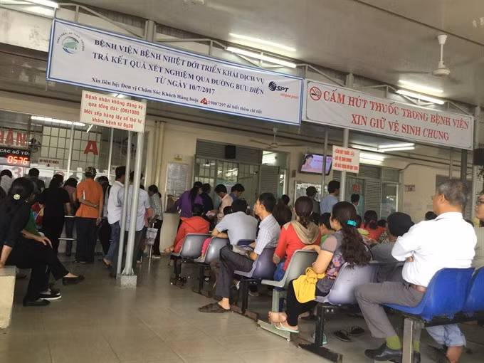 Higher hospital fees hit patients without insurance ảnh 1
