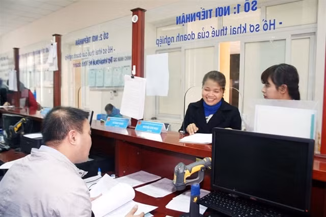 Tax authorities to cut at least 20% of compliance costs related to business activities ảnh 1