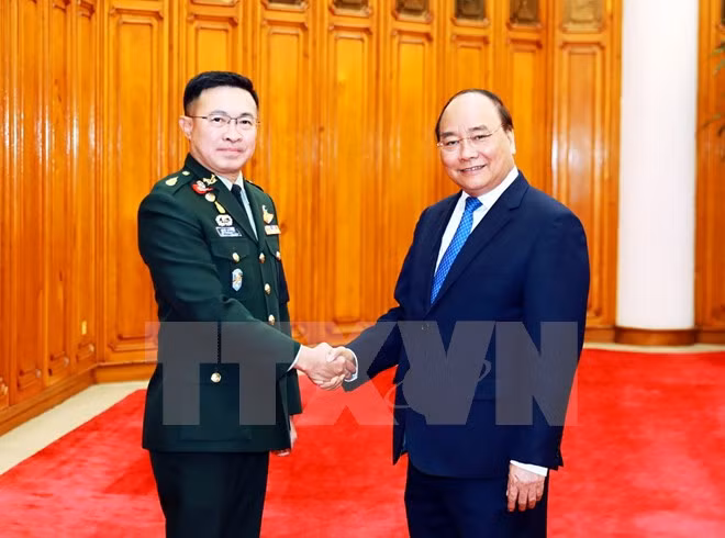 PM vows to facilitate Vietnam-Thailand military cooperation ảnh 1