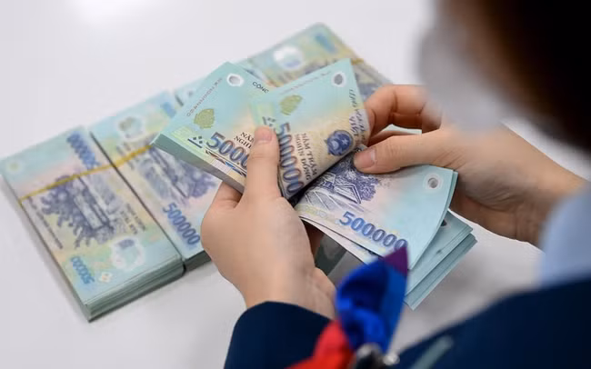 Central bank continues to reduce policy interest rates ảnh 1