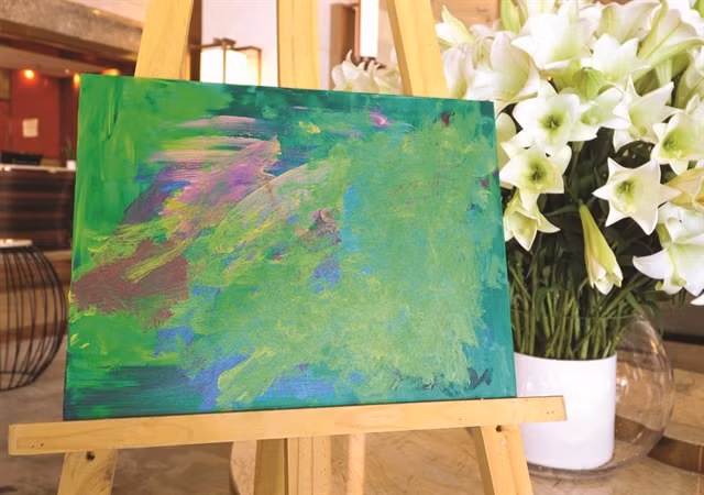 Fund-raising exhibition presents paintings by children with autism ảnh 1