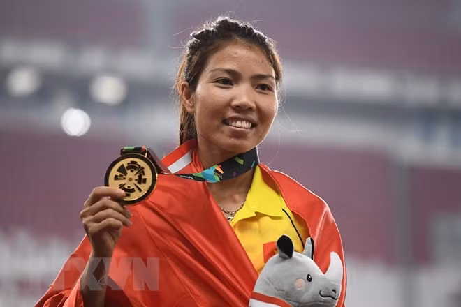 Vietnamese athlete rewarded after winning gold medal ảnh 1