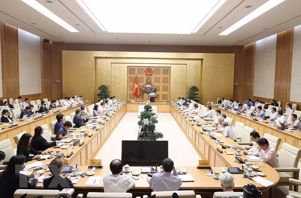 PM asks for more efforts to stablise macroeconomy, control inflation ảnh 1