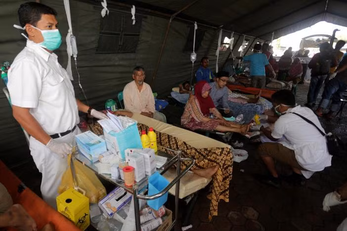 Death toll in Indonesia quake approximates 100 ảnh 1