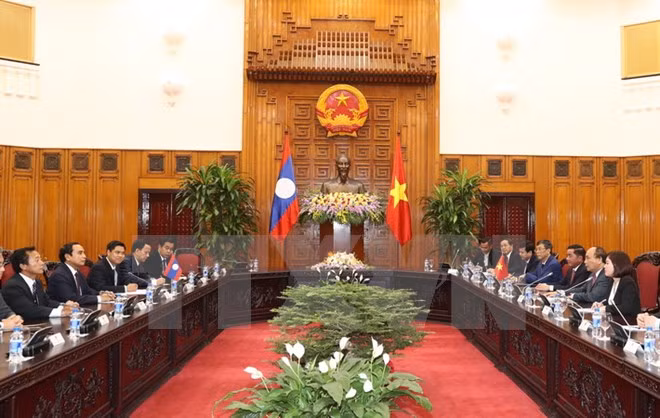 PM: Vietnam, Laos need to enhance inspection cooperation ảnh 1