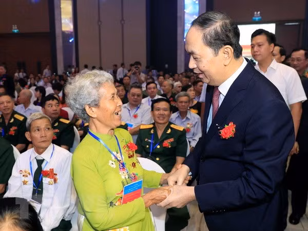 State pays special attention to caring for revolution contributors: President ảnh 1