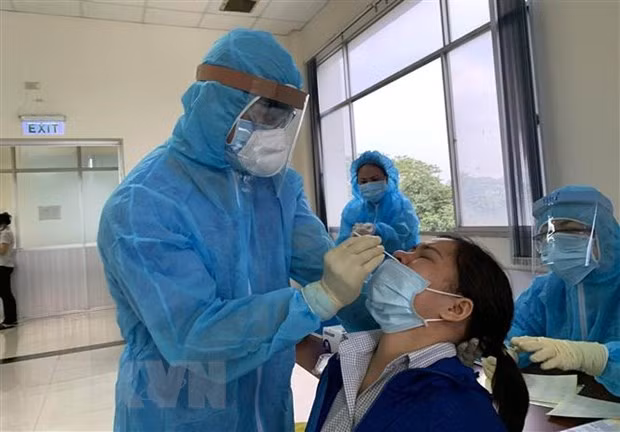 Additional 57 local COVID-19 cases recorded in Vietnam ảnh 1