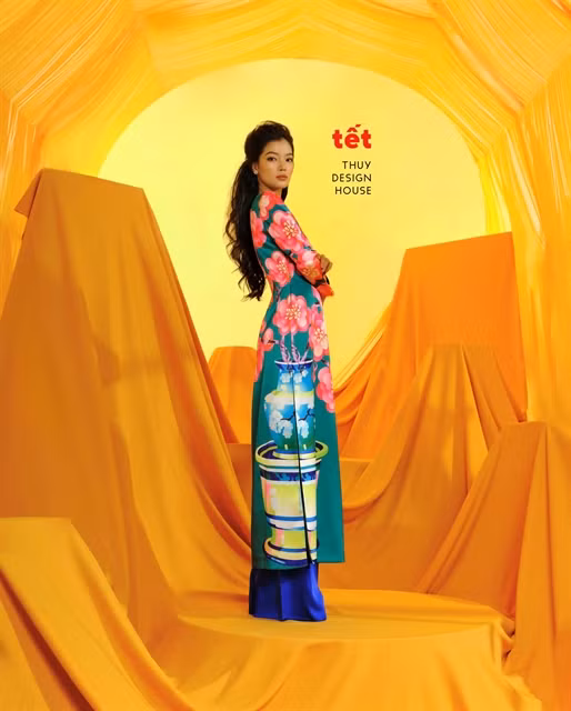 Famous designer's ao dai collection celebrates 'Tet' ảnh 1