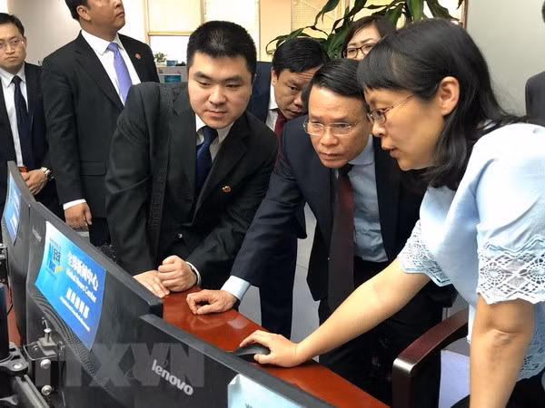 Vietnam News Agency leader active in China ảnh 1