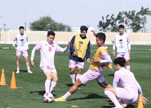 Vietnamese players encouraged after loss, promise good result against Iraq ảnh 1