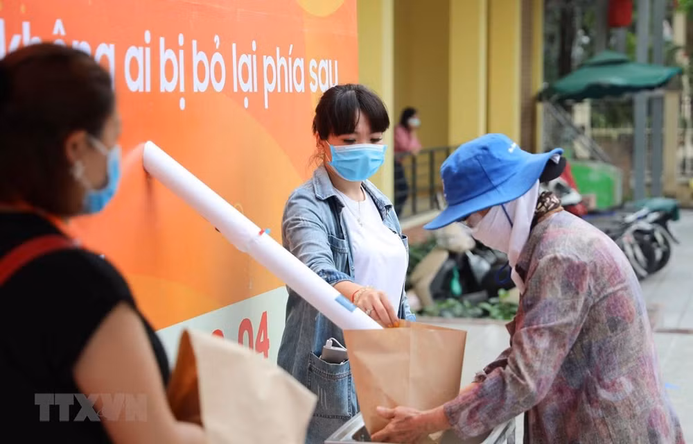Vietnam “rice ATMs” spotlighted on international news ảnh 1