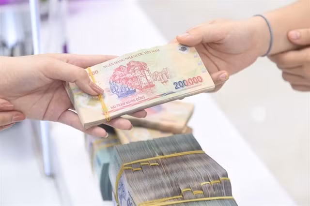 Decree on 2 percent interest rate support package officially issued ảnh 1