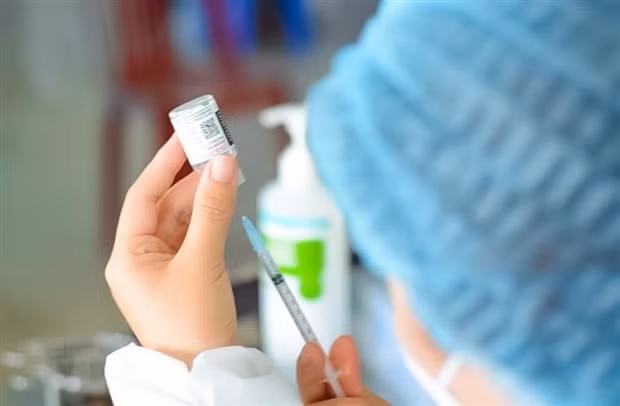 Vietnam reports 1,239 new COVID-19 cases, no death on May 27 ảnh 1