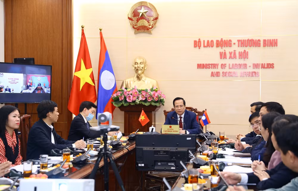 Vietnam, Laos talk enhancement of labour, social welfare cooperation ảnh 1