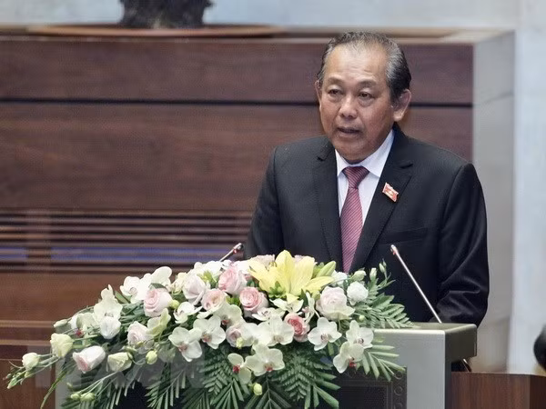 Deputy PM stresses need to improve national competitiveness at NA session ảnh 1