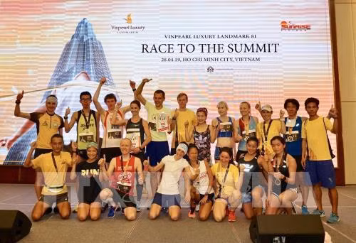 HCM City: over 700 runners conquer 81-storey skyscraper ảnh 1