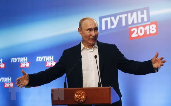Party chief congratulates re-elected President V. Putin ảnh 1