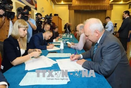 Russians in Vietnam cast ballots in presidential election ảnh 1