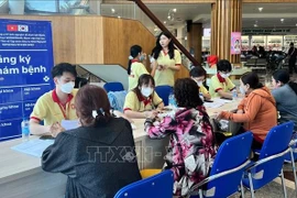 The reception area for medical consultations within the programme. (Photo: VNA)