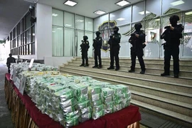 Thai police display crystal meth seized in Bangkok in early 2023. (Photo: AFP/VNA)