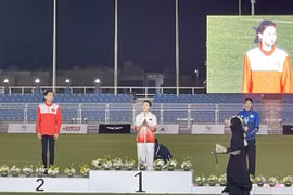 Mai Ngoc Anh (left) on the podium of the Asian U18 Athletics Championships' high jump event in Qatif, Saudi Arabia. (Photo: Vietnam Sports Team) 