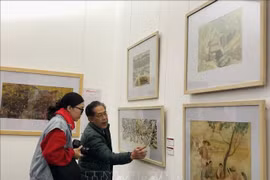 At the exhibition to mark the 95th anniversary of the founding of the Communist Party of Vietnam (CPV) (February 3, 1930 – 2025) and celebrate the Lunar New Year of the Snake. (Photo: VNA)