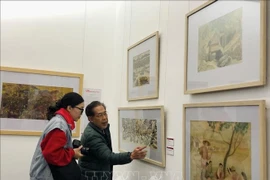 At the exhibition to mark the 95th anniversary of the founding of the Communist Party of Vietnam (CPV) (February 3, 1930 – 2025) and celebrate the Lunar New Year of the Snake. (Photo: VNA)