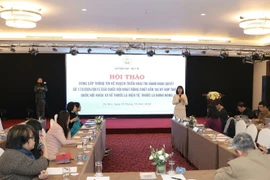 The workshop held by the Ministry of Health’s Department of Legal Affairs in Hanoi on December 25 to provide information about a plan to implement the National Assembly's resolution involving the ban of e-cigarettes and heated tobacco products. (Photo: VNA)