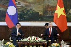 Party chief hosts top leader of Laos ahead of national reunification anniversary