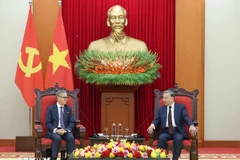 General Secretary To Lam meets with Lao Minister of Foreign Affairs